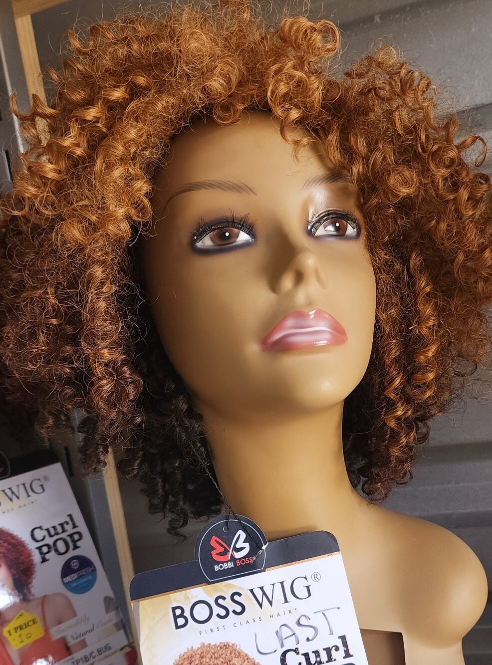 Bobbi Boss Womens Curly Wig in Copper Brown